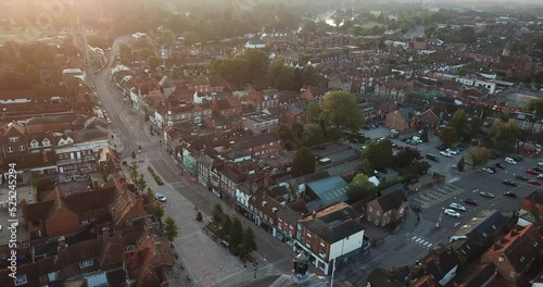 Rare drone shot of Henley on Thames high street, panning from the town hall down to the bridge. photo