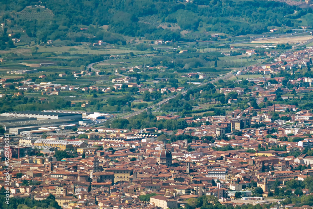 Panoramic aerial view of the historic center of Pistoia, Italy, and its surroundings, on a sunny day