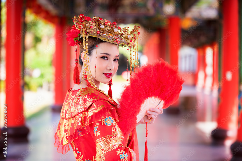 Portrait young beautiful Asian woman wear red cheongsam red