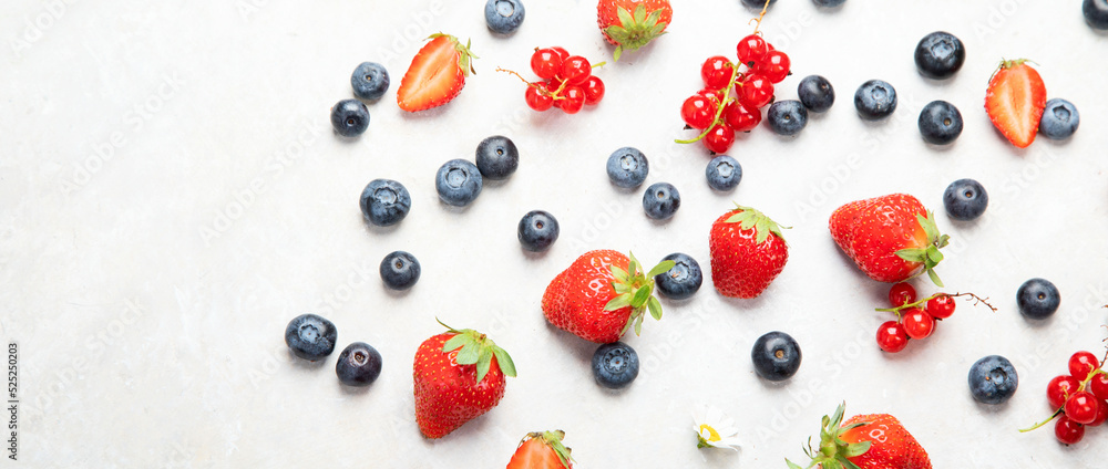 Various fresh berries on neutral background. Various fresh berries on neutral background.