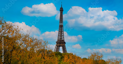 Eiffel Tower, iconic Paris landmark as autumn trees park with blue sky scene at Paris ,France