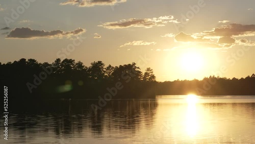 Golden Sunset Reflecting On Calm Waters Of Atsion Lake In Shamong Township, New Jersey, USA. wide photo