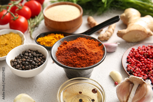 Fototapeta Naklejka Na Ścianę i Meble -  Different aromatic spices on light table