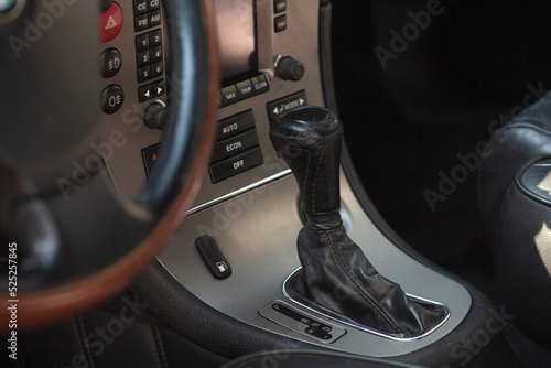 Closeup of automatic transmission inside car salon