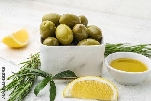 Bowls of tasty green olives...