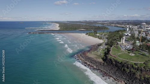 View Of Tweed River Mouth And Letitia Beach From Point Danger And Duranbah Beach In NSW, Australia. aerial drone pullback photo