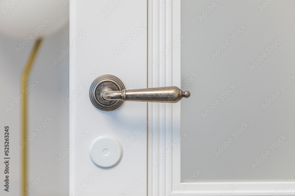Door handle and lock on the interior door Door handle and lock on the interior door
