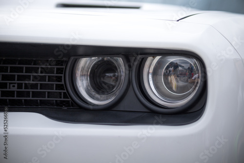 headlight of a modern prestigious white car © Евгений Бордовский