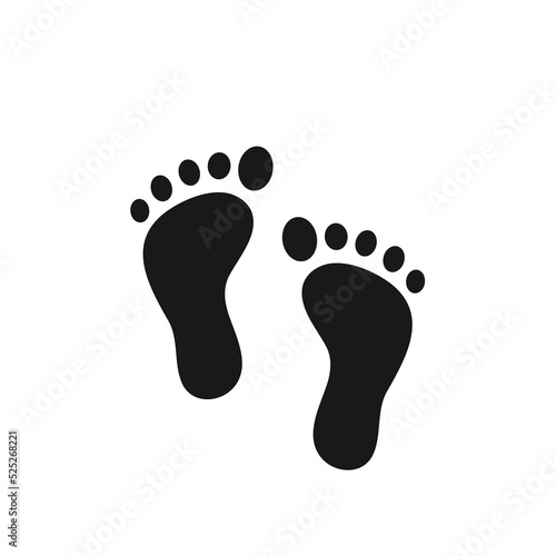 Baby footprints. Human feet standing on the ground. Isolated on white background. © anuwat
