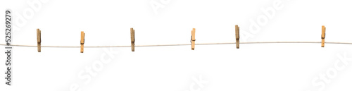 Old wooden clothespins on a rope isolated on  transparent background photo
