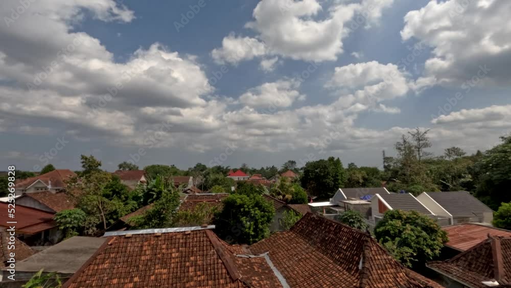 Time lapse of cloud movement over residential areas in rural areas Time lapse of cloud movement over residential areas in rural areas