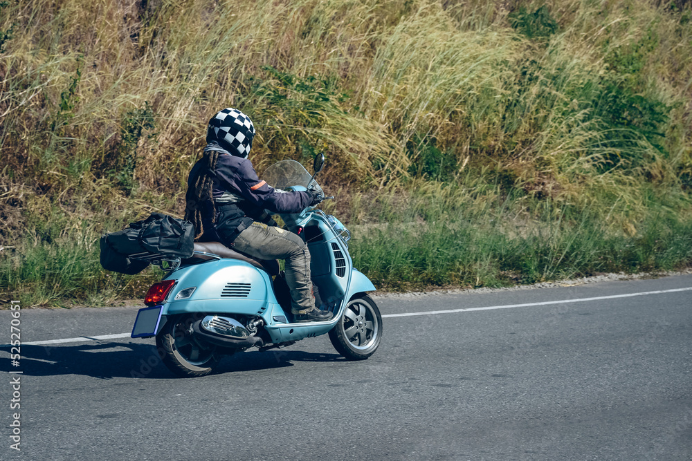 motorcycle on the road rides away. Travel on vacation, enjoy the nature trail motorcycle on the road rides away. Travel on vacation, enjoy the nature trail
