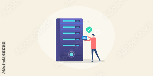 IT technology engineer using laptop in-front of server rack, working on business data center management solution concept. 