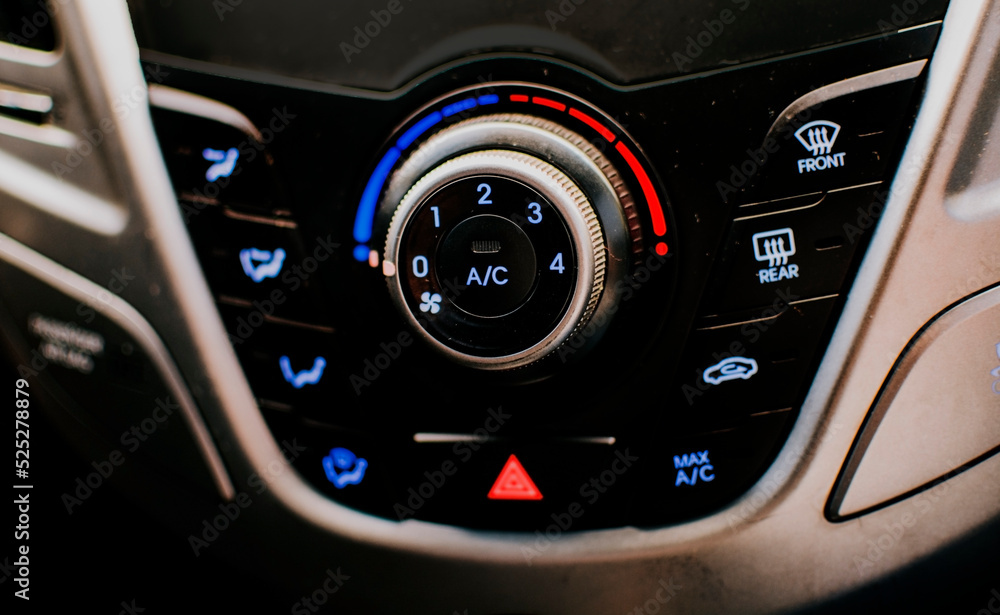 Front view of a car air conditioning control panel. Air conditioning knob of a car. Close up of automotive air conditioning switch panel