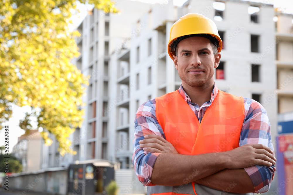 Professional engineer in safety equipment at construction site Professional engineer in safety equipment at construction site