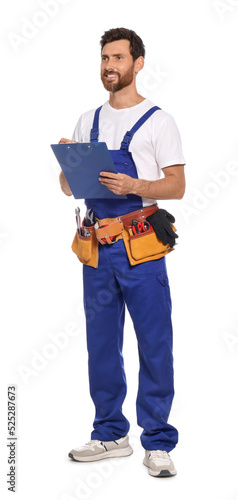 Professional plumber with clipboard and tool belt on white background