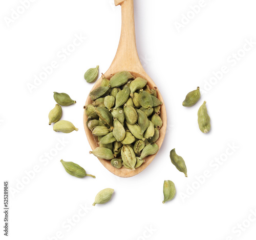 Wooden spoon with cardamom isolated on white, top view