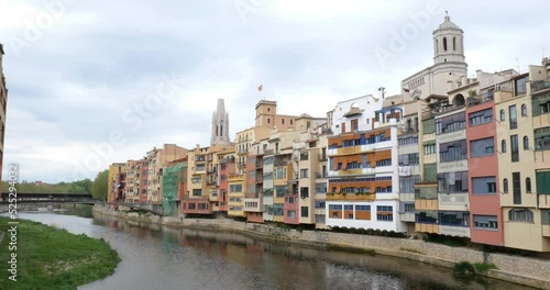 Girona, Catalonia, Spain. Colorful, painted houses by the Onyar River. photo