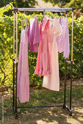 Stylish, fashionable summer dress on a hanger. © Vasyl