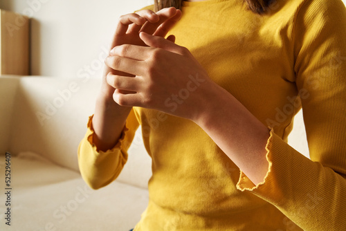 Teenage girl practicing EFT tapping or emotional freedom technique