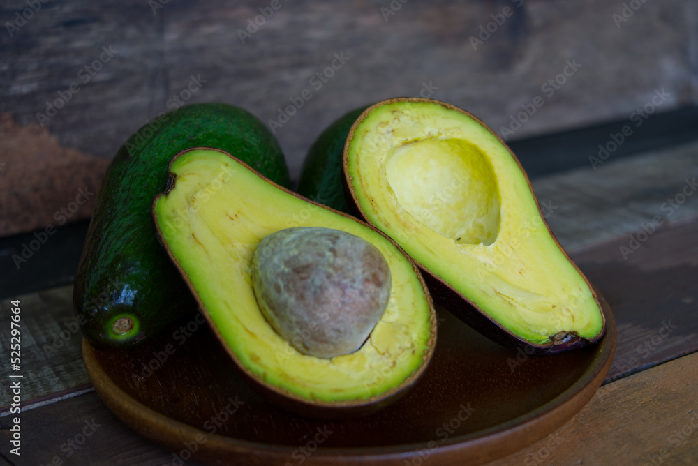 avocado cut in half avocado cut in half
