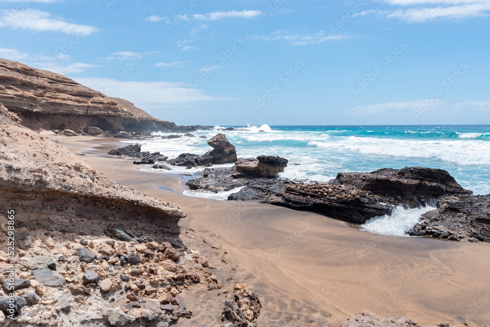 Scenic View of Sealandscape on a Sunny day in Fuerteventura, Canary Island Scenic View of Sealandscape on a Sunny day in Fuerteventura, Canary Island