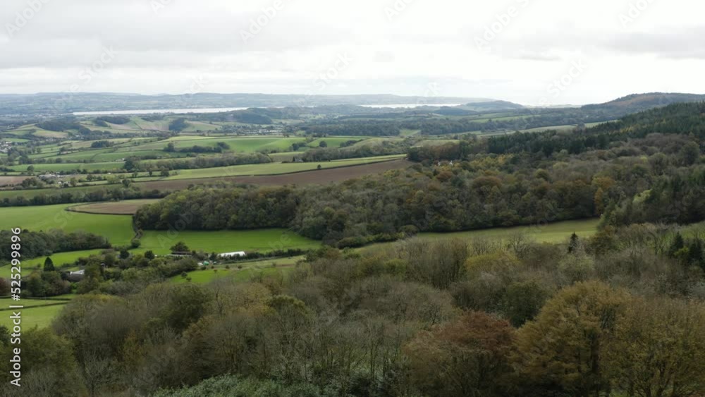 Lawrence Castle Overlooking Sweeping Countryside Nature In Higher Ashton, Exeter, United Kingdom. Aerial Wide Shot Lawrence Castle Overlooking Sweeping Countryside Nature In Higher Ashton, Exeter, United Kingdom. Aerial Wide Shot