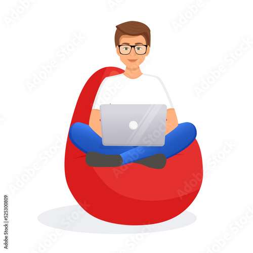 Man sits on a bean bag chair and works at a computer. Remote work, office at home, programming, freelance. Study at home in quarantine. Vector illustration.