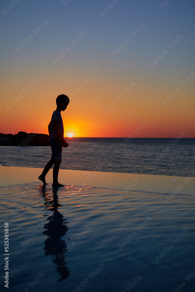 silhouette of a person on the beach sunset silhouette of a person on the beach sunset