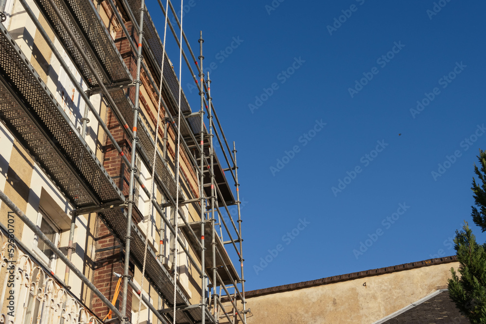 photo of a building that is being built . Photo from bottom to top