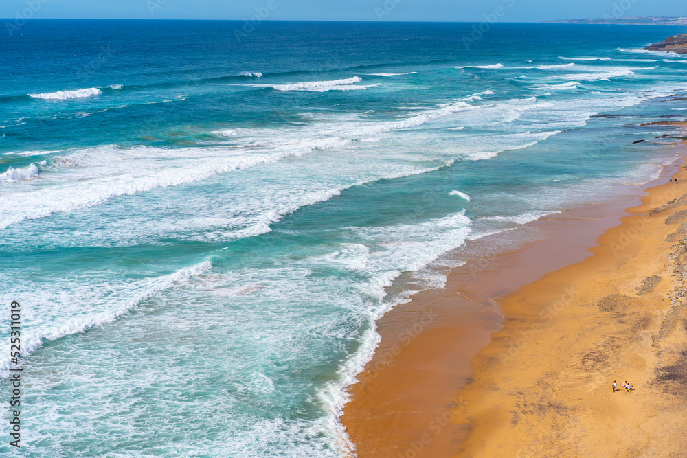 Aerial view of tropical sandy beach and ocean with turquoise water with waves. Sunny day on Atlantic ocean beach Aerial view of tropical sandy beach and ocean with turquoise water with waves. Sunny day on Atlantic ocean beach