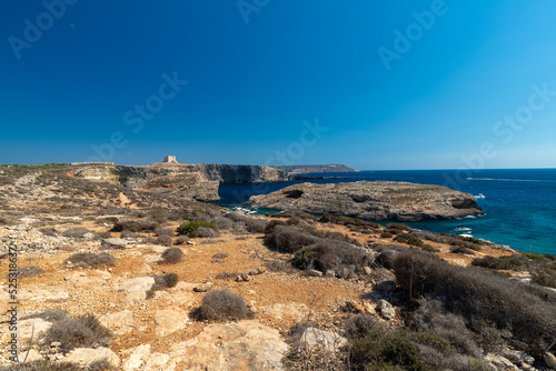 Blue Lagoon, Malta 08-04-2022 The Blue Lagoon is a popular small bay for a day trip with shallow, azure-coloured water on the West coast of Comino island, between Malta and Gozo in the Mediterranean