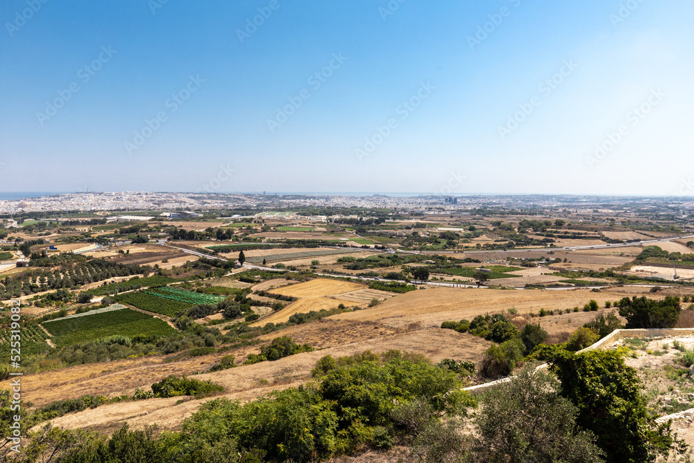 View over the Island of Malta from the observation point of the former capital Mdina of the island which has a medieval defense wall with several lookouts.