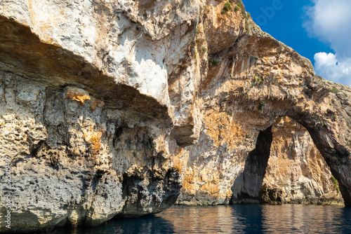 The Blue Grotto is a complex of sea caves along the Southeastern part of Malta, and on sunny days, the reflection of sunlight on the white sandy seafloor lights up the caves in bright blue hues