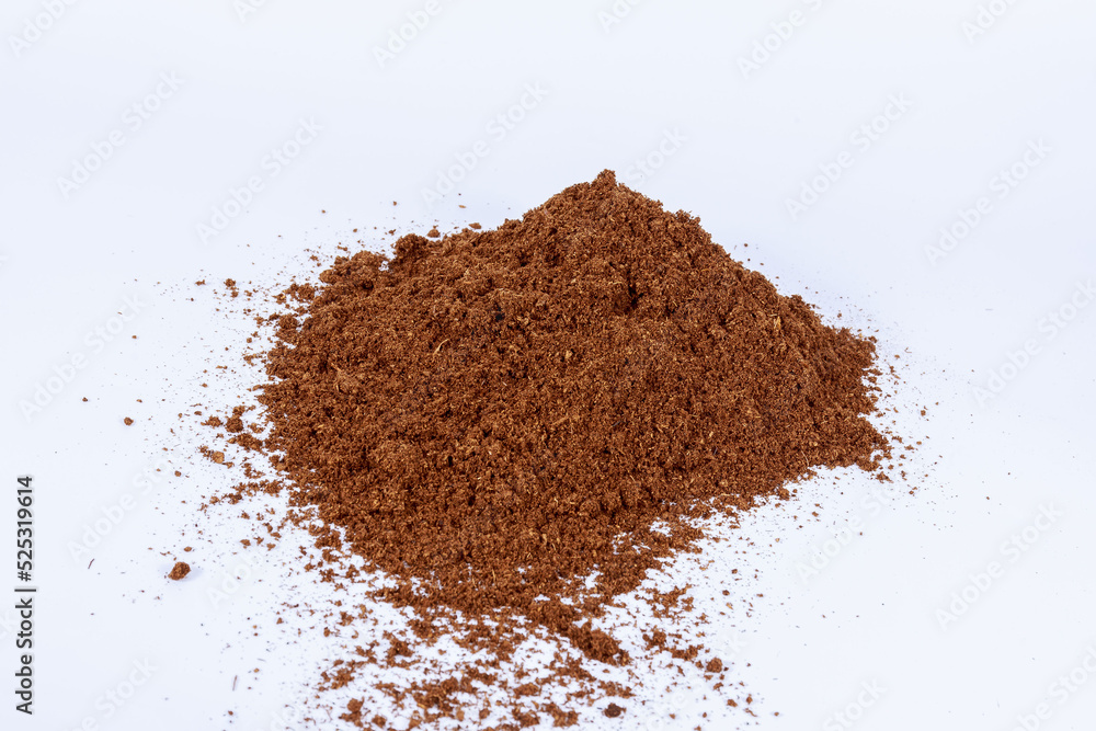 Pile of peat scattered on a white background. Pile of peat scattered on a white background.