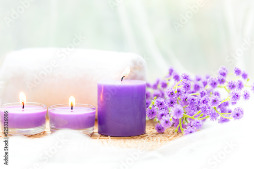 Spa beauty massage health wellness background.   Spa Thai therapy treatment aromatherapy for body woman with purple flower nature candle for relax and summer time. Lifestyle Health Concept