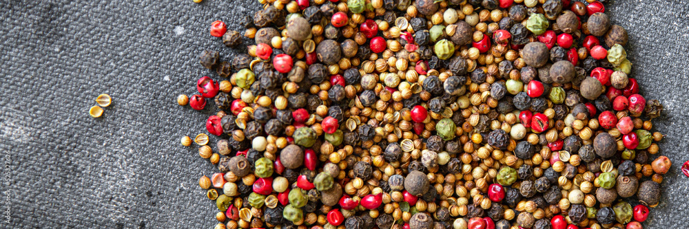 peppercorn 5 spices red, black, green and white pepper, coriander fresh food spice on the table copy space food background peppercorn 5 spices red, black, green and white pepper, coriander fresh food spice on the table copy space food background