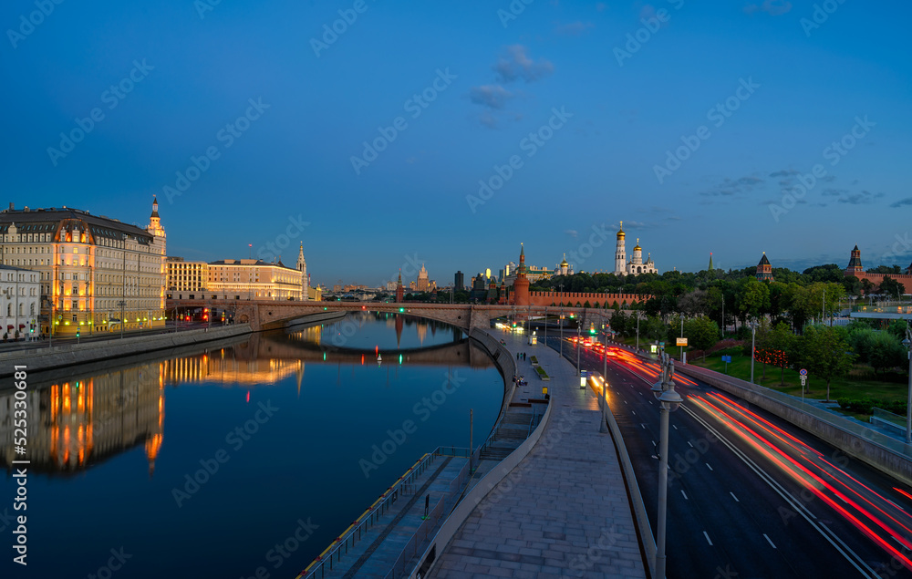 Night view of Moscow Kremlin and Moskvoretskaya embankment in Moscow, Russia. Architecture and landmarks of Moscow. Postcard of Moscow