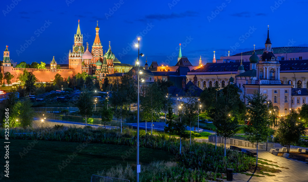 Obraz premium Spasskaya Tower, Moscow Kremlin, Saint Basil's Cathedral, Park Zaryadye at night in Moscow, Russia. Architecture and landmarks of Moscow. Postcard of Moscow