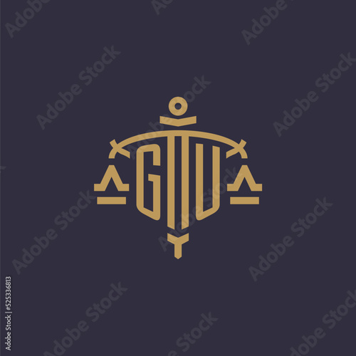 Monogram GU logo for legal firm with geometric scale and sword style
