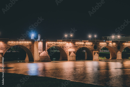 Reflection of lights on the river in the city, reflections in the river city of badajoz