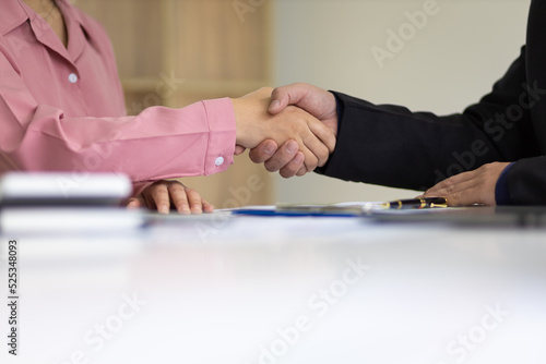 Handshake, business partners shaking hands, business support and cooperation concept.