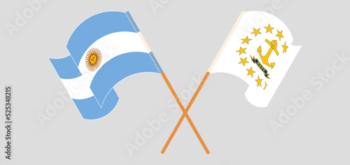 Crossed and waving flags of Argentina and the State of Rhode Island