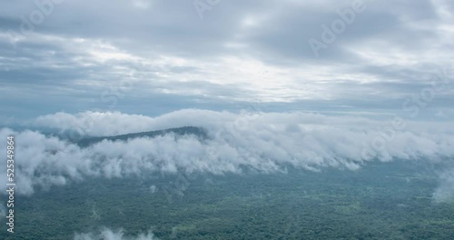fog at the waves passing through the mountains