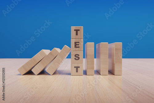 Test text made with wooden blocks on a table