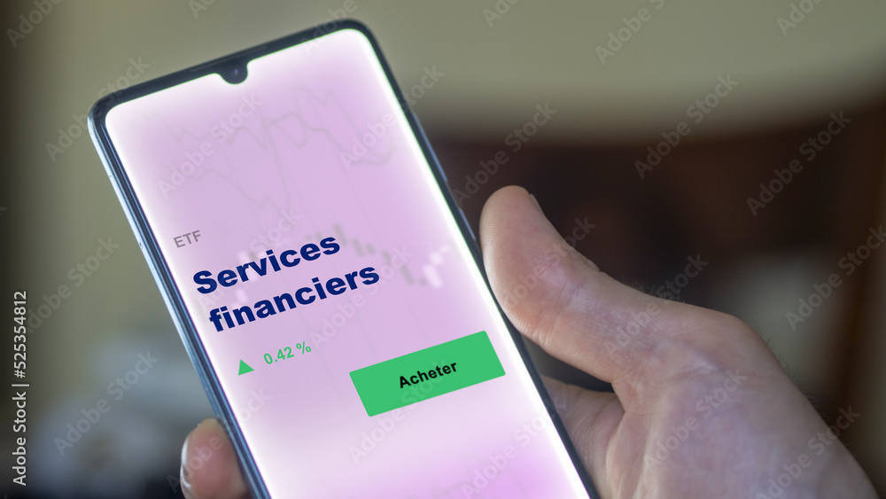 Investir dans un fonds etf services financiers actions en bourse sur un écran. Graphique, courbes, chandelles d'ETF. Investir dans un fonds etf services financiers actions en bourse sur un écran. Graphique, courbes, chandelles d'ETF.