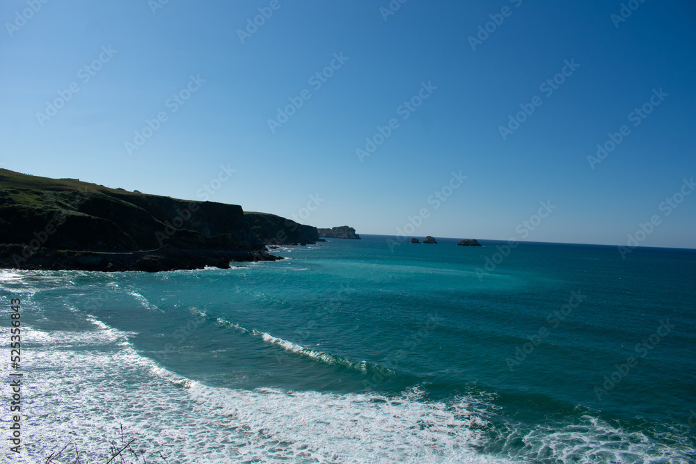 Panorama of the coastline of Usgo beach, in the north o Spain in Cantabria Panorama of the coastline of Usgo beach, in the north o Spain in Cantabria