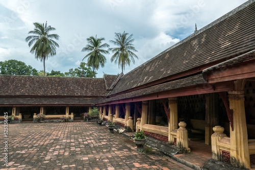 Wat Si Saket Temple in Vientiane, Laos. It was built in the Siamese style of Buddhist Art, with a surrounding terrace and an ornate five-tiered roof