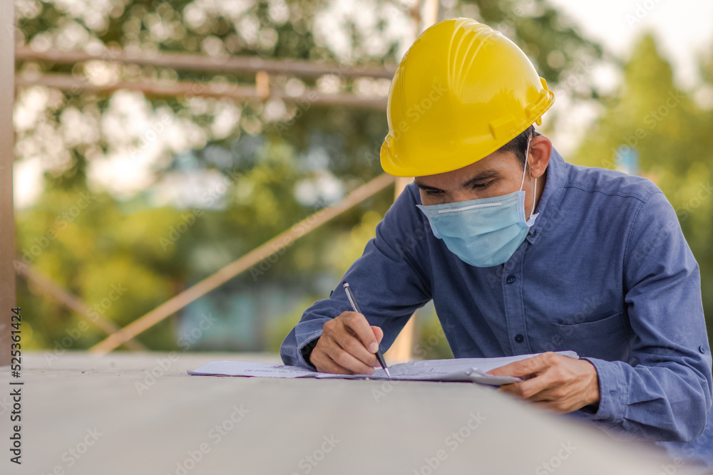 Fototapeta premium Asian Manager engineer in construction site control building project development