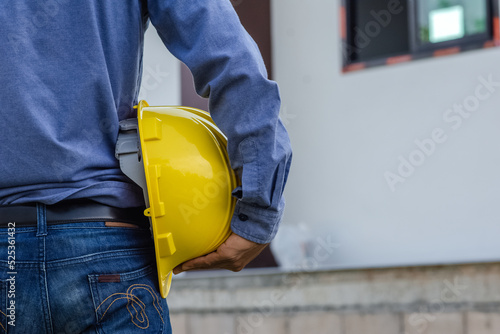 Engineer holding hard hat construction worker professional safety work industry building person manager service